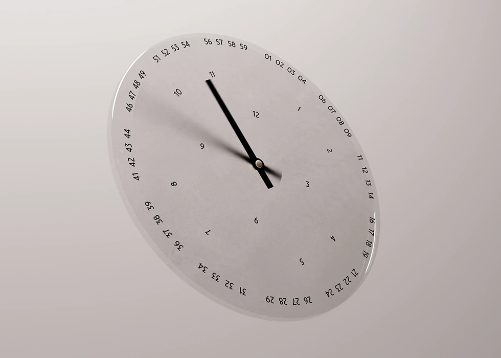 Horloge circulaire, où chaque heure et minute sont écrites avec la police MF Fondation disponible chez Milletype Foundry